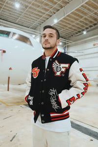 Manifest Varsity Jacket (Black) Fly Supply Co
