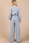 Ces Femme Boat Neck Long Sleeve Jumpsuit with Drawstring Detail