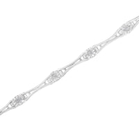 .925 Sterling Silver 1/4 Cttw Diamond Miracle-Set Flared-Bar 7" Link-Style Tennis Bracelet (I-J Color, I3 Clarity)