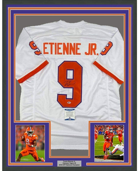 Framed Autographed/Signed Travis Etienne Jr. 35x39 Clemson White College Football Jersey Beckett BAS COA