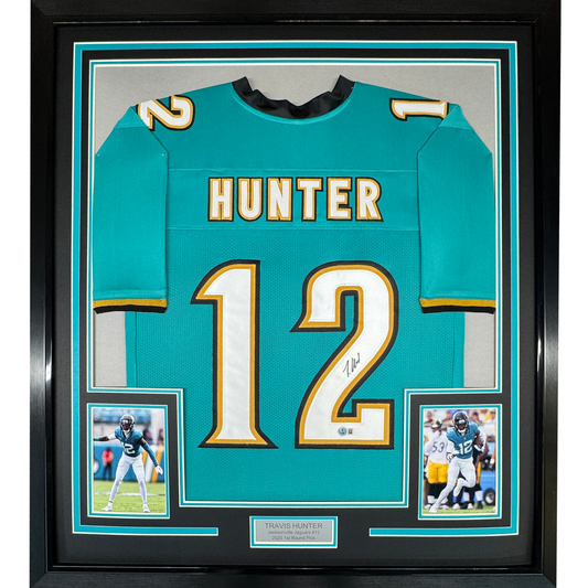 Framed Autographed/Signed Travis Hunter 35x39 Jacksonville Teal Retro Football Jersey Beckett BAS COA