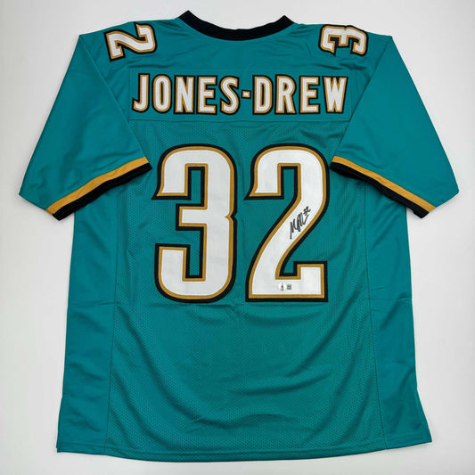 Autographed/Signed Maurice Jones-Drew Jacksonville Teal Football Jersey Beckett BAS COA