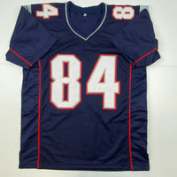 Autographed/Signed Deion Branch #84 New England Blue Football Jersey JSA COA