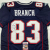 Autographed/Signed Deion Branch #83 New England Blue Football Jersey JSA COA