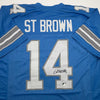 Autographed/Signed Amon-Ra St. Brown Detroit Current Blue Football Jersey Beckett BAS COA
