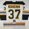 Autographed/Signed Patrice Bergeron Boston White Hockey Jersey JSA COA