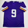 Autographed/Signed J.J. JJ McCarthy Minnesota Purple Football Jersey Beckett BAS COA