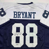 Autographed/Signed Dez Bryant Dallas Thanksgiving Day Football Jersey Beckett BAS COA