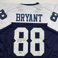 Autographed/Signed Dez Bryant Dallas Thanksgiving Day Football Jersey Beckett BAS COA