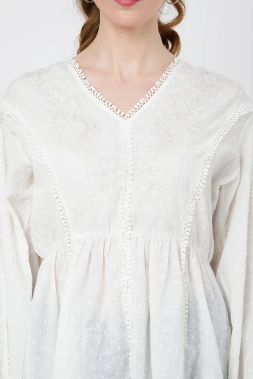 tonal embroidered peplum top with v neckline s to 2xl