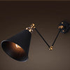 Vintage-Inspired Folding Wall Mounted Light Fixture Design